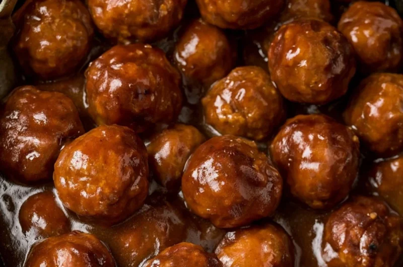 Slow cooker Salisbury steak meatballs served with gravy over mashed potatoes