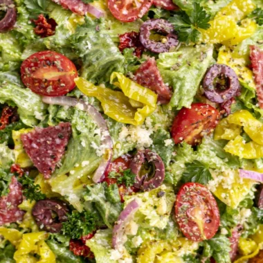 Delicious classic Italian salad with fresh vegetables and dressing.