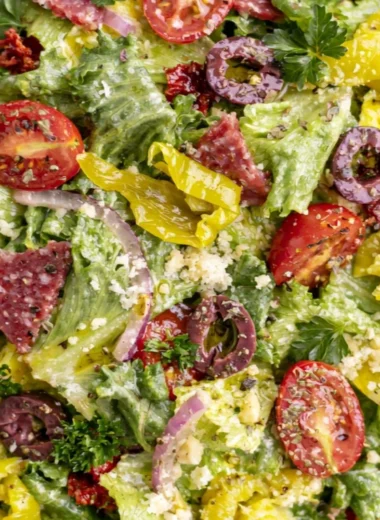Delicious classic Italian salad with fresh vegetables and dressing.