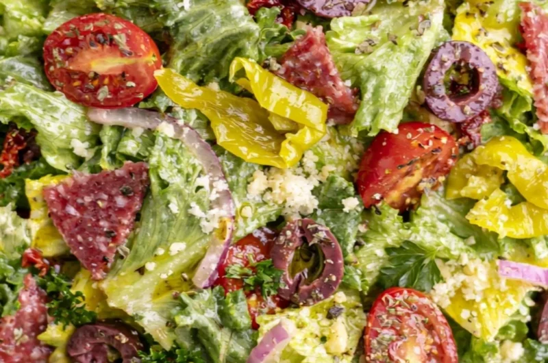 Delicious classic Italian salad with fresh vegetables and dressing.
