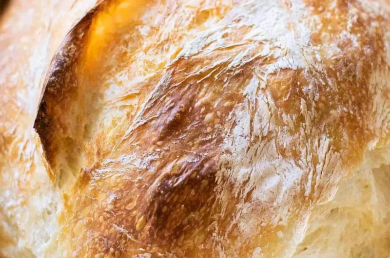 Freshly baked no-fail sourdough bread with a crispy crust and soft interior