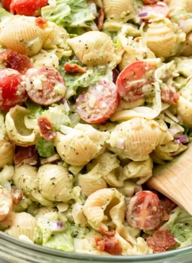 Delicious BLT Pasta Salad with bacon, lettuce, and tomatoes in a bowl