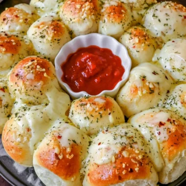 Delicious cheesy garlic monkey bread served warm and gooey