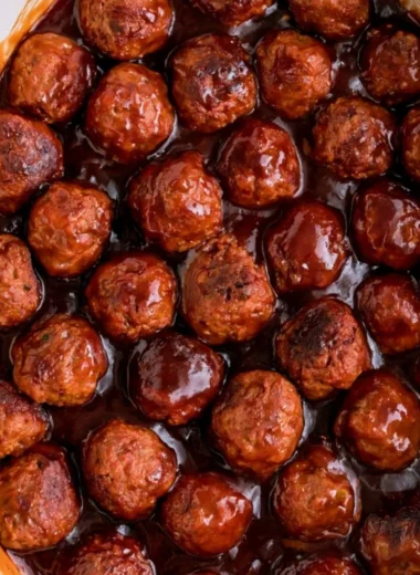 Cozy three-ingredient grape jelly meatballs served on a platter